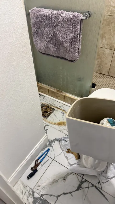 Drain line snaked and cleared by Orlando FL plumber